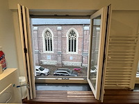 Dubbel opendraaiende pvc raam beige (dubbel glas) - afbeelding 5 van  5