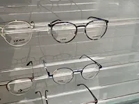 Dubbelzijdige metalen display met brillen - afbeelding 11 van  25