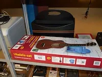 Elektrische verwarming, kleuren tv salora, 3 sigarettenmachientjes, 6 dames uurwerken, ukelele set, planningsbord - afbeelding 5 van  8