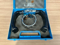 Escalator handrail tension chain