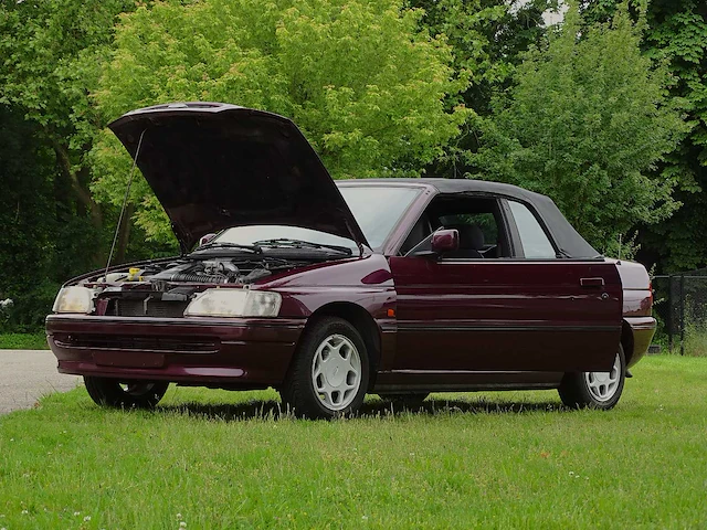Ford escort cabrio 1.6i - afbeelding 35 van  48
