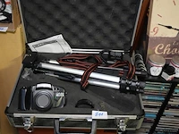 Fototoestel met accesoires in valies