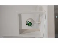Golfbal ode aan rene magritte - afbeelding 1 van  4