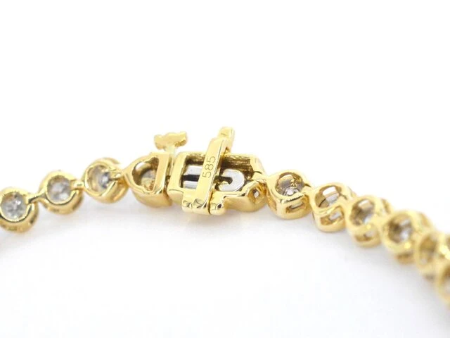 Gouden armband vol met diamanten gezet - afbeelding 7 van  8