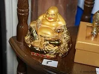 Goudkleurige happy boedha