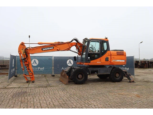 Graafmachine doosan dx140w diesel 140pk 2012 - afbeelding 1 van  1