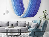 Grote macramé wanddecoratie