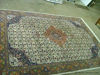Hand geknoopt tapijt