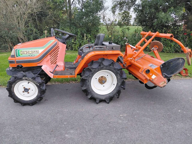 Hinomoto c14 vierwielaangedreven minitractor met grondfrees - afbeelding 12 van  17