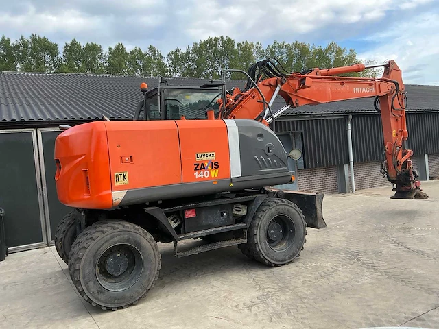 Hitachi zaxis 140w banden graafmachine - afbeelding 11 van  17