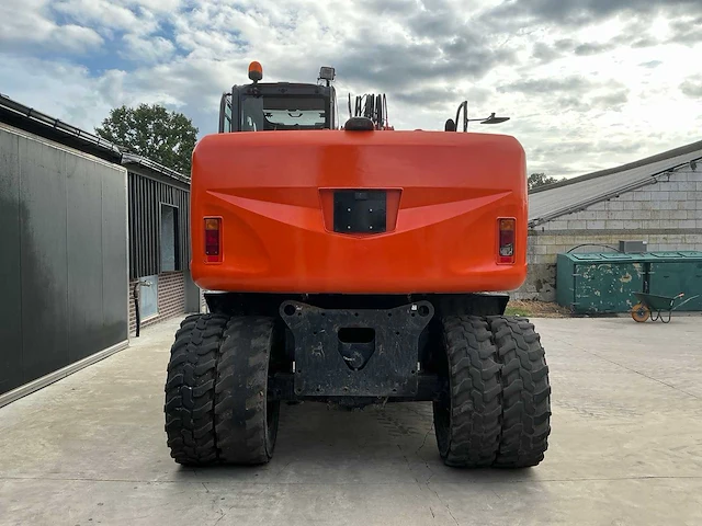 Hitachi zaxis 140w banden graafmachine - afbeelding 12 van  17