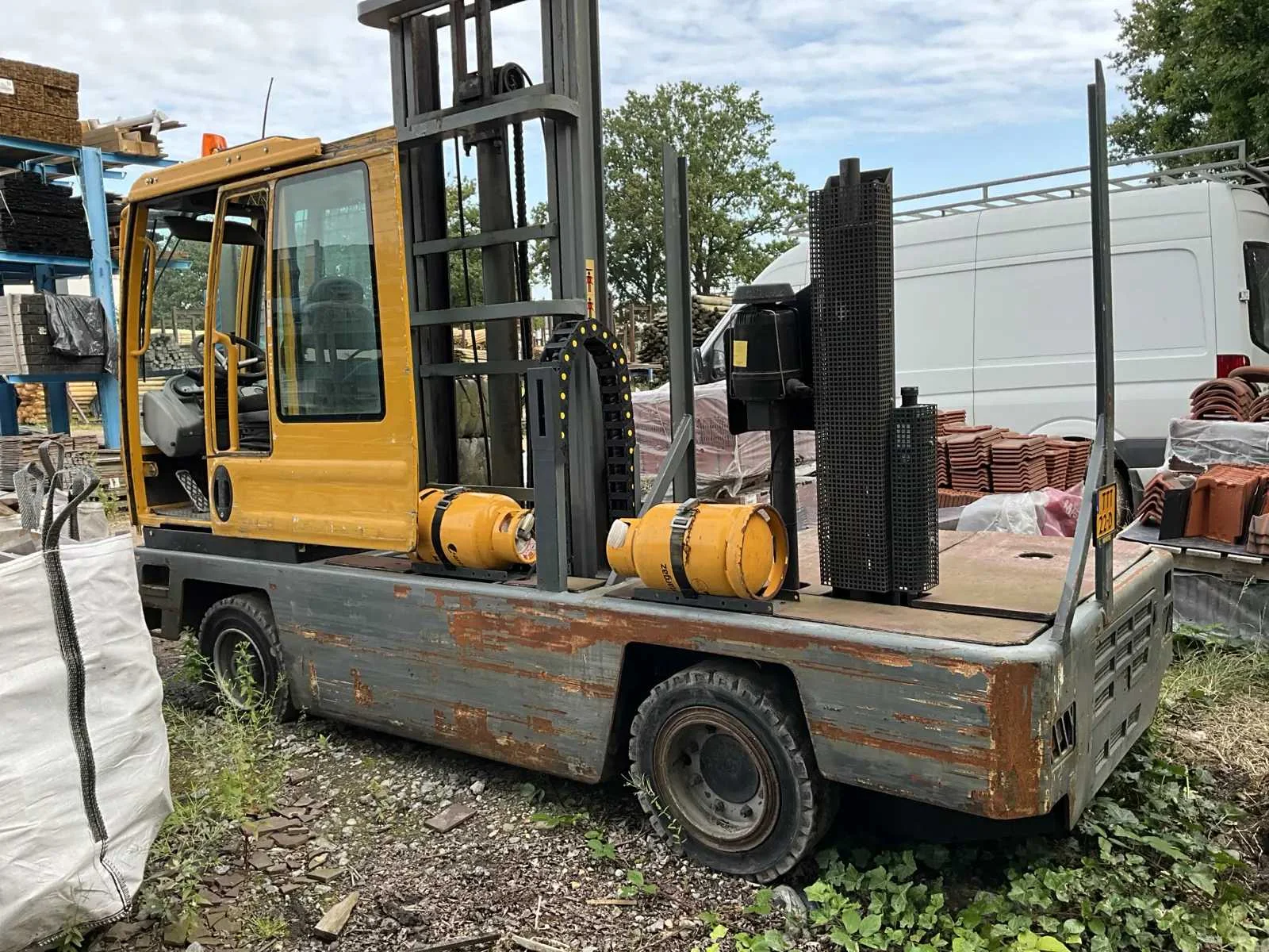 Houtvoorraad, machines & (intern) transport wegens stockopruiming