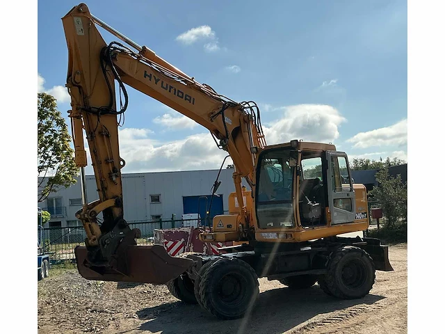 Hyundai robex140w-7 banden graafmachine - afbeelding 1 van  19