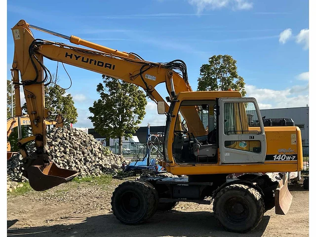Hyundai robex140w-7 banden graafmachine - afbeelding 12 van  19