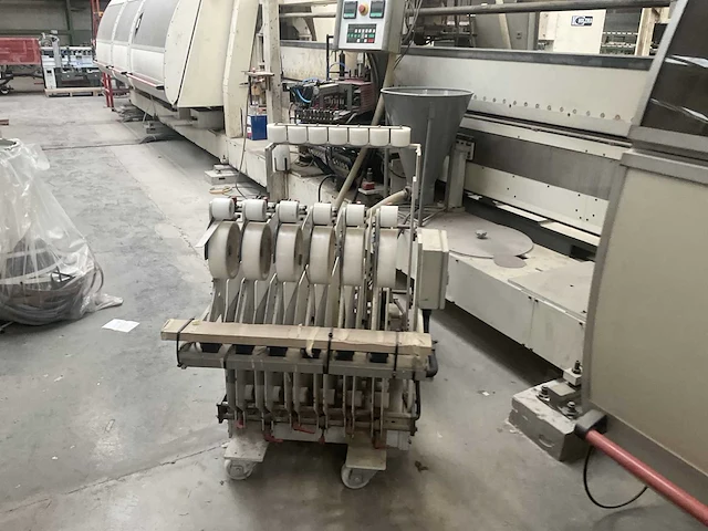 Ima - volautomatische assengestuurde vier-kanten aanlijmmachines - 2000- houtbewerking - houtbewerkingsmachines - afbeelding 18 van  21