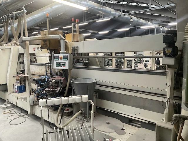 Ima - volautomatische assengestuurde vier-kanten aanlijmmachines - 2000- houtbewerking - houtbewerkingsmachines - afbeelding 19 van  21
