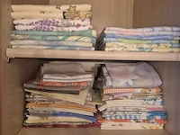 Jassen, bontjassen en beddengoed volgens foto - afbeelding 2 van  3