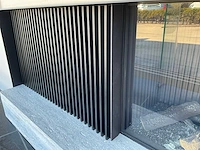 Kal-fire gi110/55cr gaskachel met siersteen en design achterwand en zijkant die doorloopt - afbeelding 7 van  9