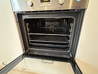 Keuken met inrichting en kookeiland - afbeelding 12 van  14