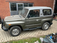 Kia retona personenauto - afbeelding 1 van  16