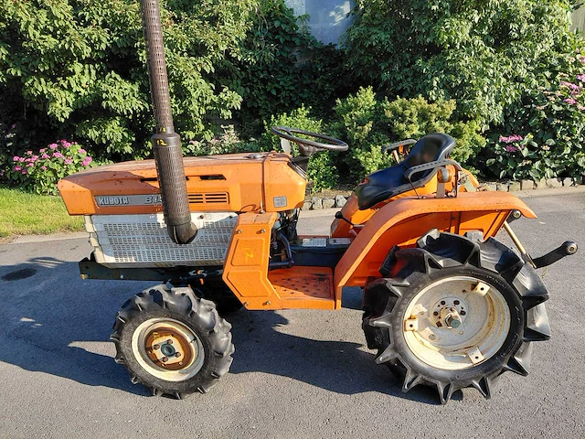 Kubota b1400 vierwielaangedreven minitractor - afbeelding 1 van  14