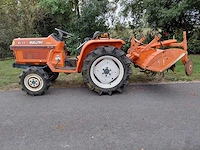 Kubota b17 vierwielaangedreven minitractor met grondfrees - afbeelding 1 van  20