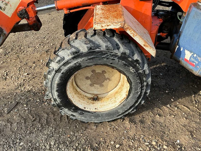 Kubota r310 met backhoe shovel - afbeelding 39 van  39