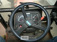Kubota tractor met schaaf en strooier - afbeelding 20 van  22
