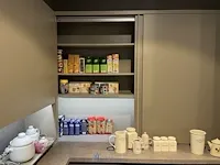 L-vormige keuken met eiland - afbeelding 17 van  27