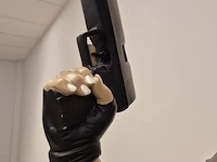 Levensgroot beeld lara croft - afbeelding 11 van  14