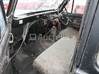 Londense taxi om austin te herstellen - afbeelding 2 van  11