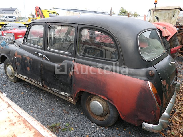 Londense taxi om austin te herstellen - afbeelding 1 van  11