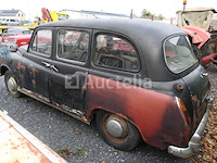 Londense taxi om austin te herstellen - afbeelding 1 van  11