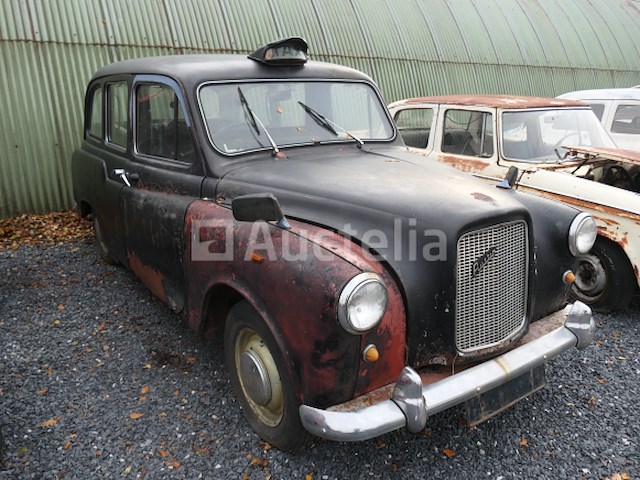 Londense taxi om austin te herstellen - afbeelding 10 van  11