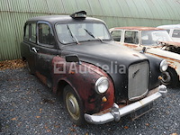 Londense taxi om austin te herstellen - afbeelding 10 van  11