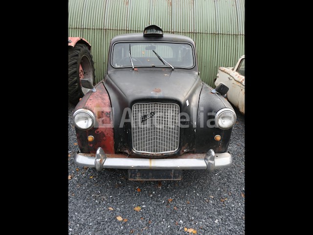 Londense taxi om austin te herstellen - afbeelding 11 van  11