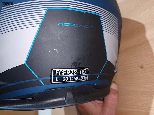 Lot 10 - motorhelm, regenpak en olie. 4 stuks - afbeelding 5 van  5