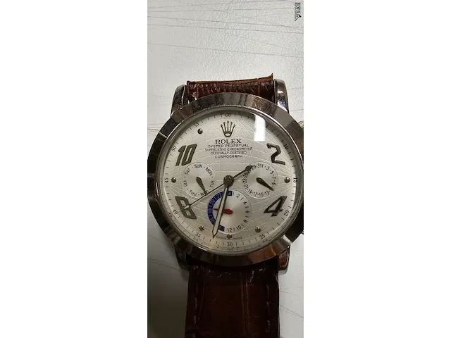 Lot 13 - polshorloge merktekens breitling en rolex - afbeelding 4 van  13
