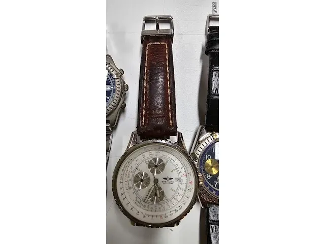 Lot 13 - polshorloge merktekens breitling en rolex - afbeelding 9 van  13