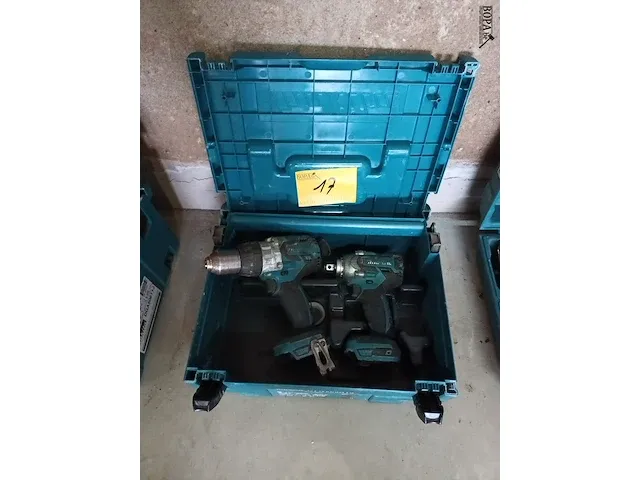 Lot 17 - accu slagmoersleutel en klopboormachine makita in koffer - afbeelding 1 van  4