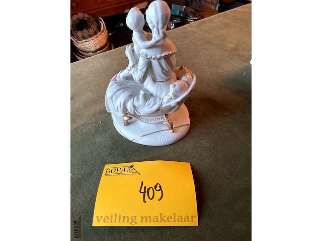 Lot 409 - gina wit met goud beeldje - afbeelding 2 van  2