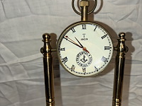 Lot 89 - glazen tafeluurwerk op bronzen voet met kompas, travertal sw - afbeelding 2 van  4