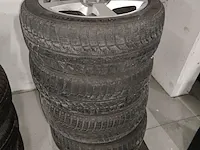 Lot 9 - evo racing velgen met winterbanden - 4 stuks