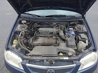 Mazda 323f - afbeelding 13 van  18