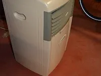 Microgolfoven whirlpool, airfryer tefal, verrijdbare airco, ronde wandklok - afbeelding 8 van  9