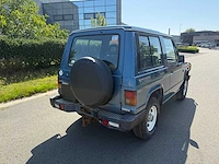 Mitsubishi - 1989 - 4x4 - jeep - personenauto - afbeelding 2 van  23