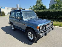 Mitsubishi - 1989 - 4x4 - jeep - personenauto - afbeelding 1 van  23