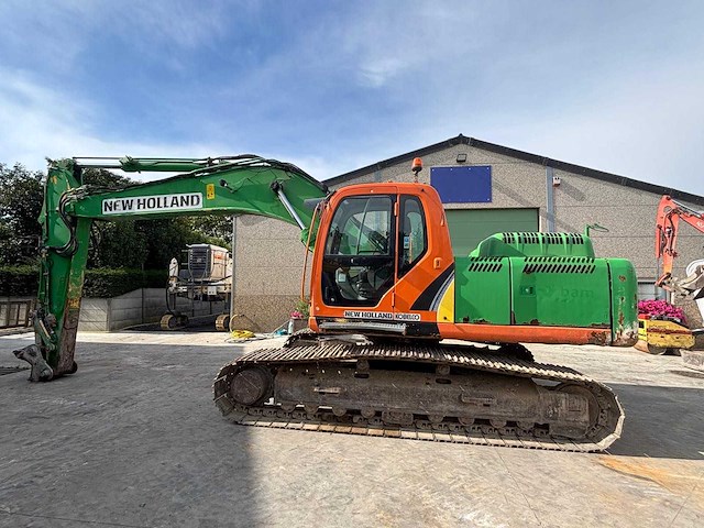 New holland - 2008 - e265 - rupsgraafmachine - afbeelding 1 van  26