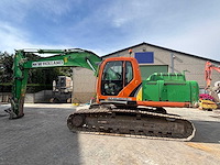 New holland - 2008 - e265 - rupsgraafmachine - afbeelding 1 van  26