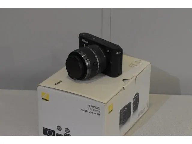 Nikon j1 + 30/110 - afbeelding 1 van  1